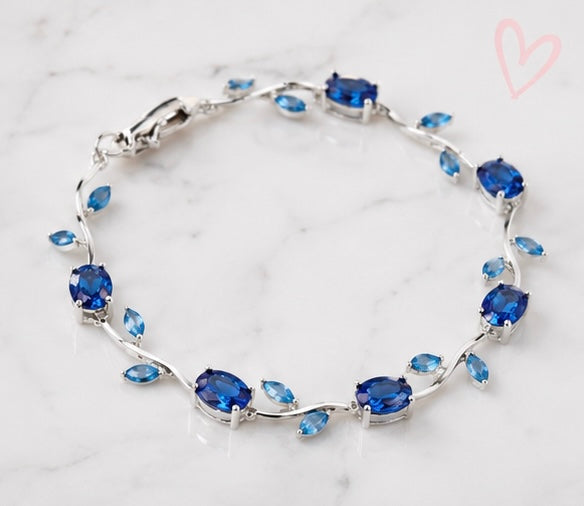The Ocean Wave Vine Bracelet by Jasper & Pine Co. – Silver & Sapphire Blue Crystal Floral Jewelry