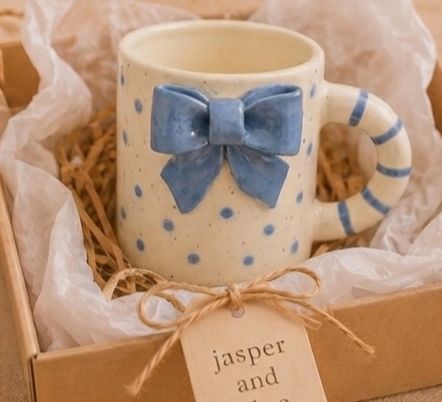 The 3D Blue Bow Ceramic Mug by Jasper & Pine Co.