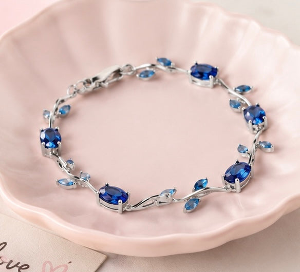 The Ocean Wave Vine Bracelet by Jasper & Pine Co. – Silver & Sapphire Blue Crystal Floral Jewelry
