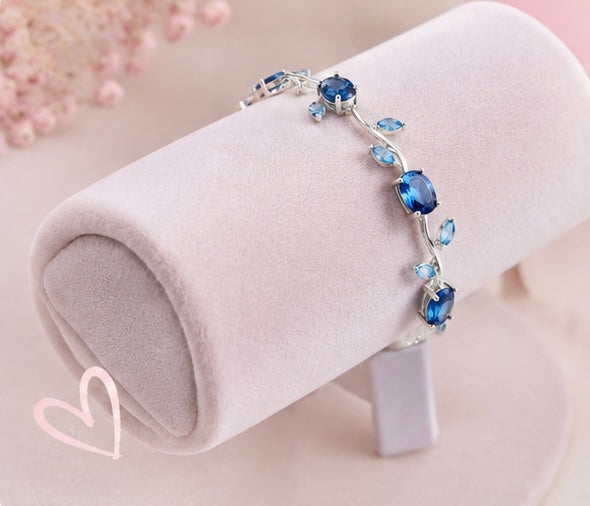 The Ocean Wave Vine Bracelet by Jasper & Pine Co. – Silver & Sapphire Blue Crystal Floral Jewelry