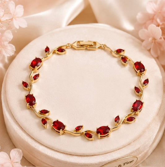 The Crimson Rose Vine Bracelet by Jasper & Pine Co. – Gold & Ruby Red Crystal Floral Jewelry