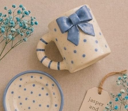 The 3D Blue Bow Ceramic Mug by Jasper & Pine Co.